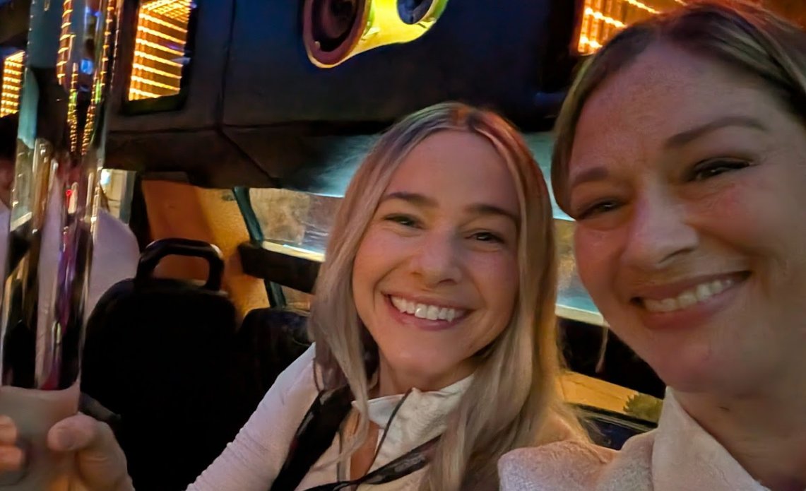 2 BuyerBridge team members smiling in a selfie at the NADA Show