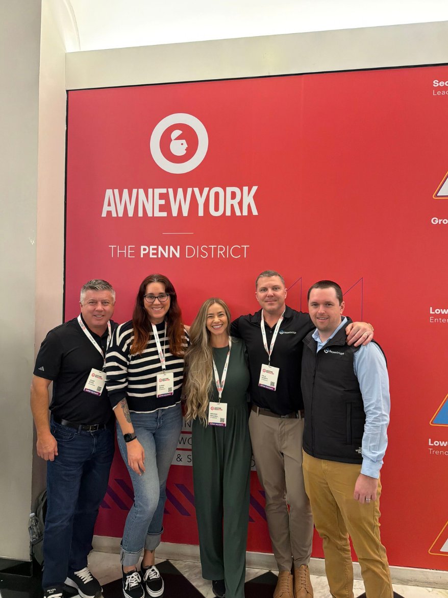 5 BuyerBridge team members at an industry event in New York
